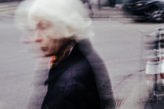 Blurry image of elderly woman